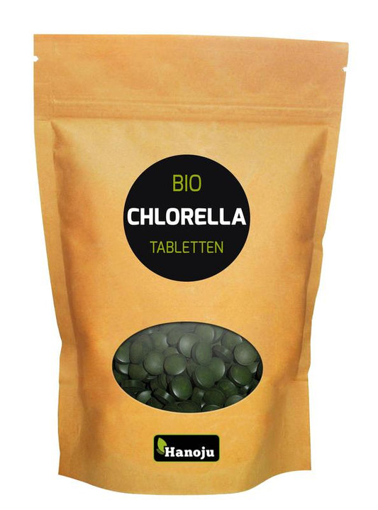 Hanoju Bio Chlorella tablets in paper bag, eco-friendly herbal supplement, 1250 tablets shown in the image.