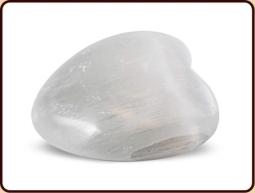 Ruben Robijn Seleniet angel heart stone, clear and smooth with carved angel shape, on a plain background.