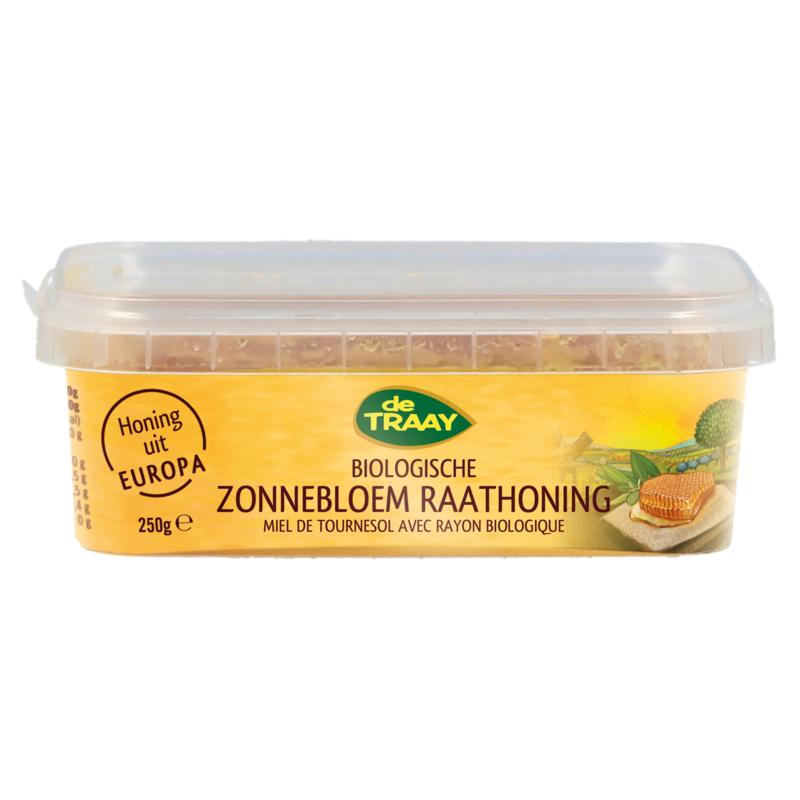 De Traay biologische zonnebloemraathoning honing in een 250g glazen pot, gele honing met zonnebloemrijke kleur en textuur.