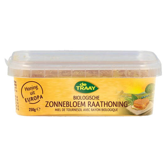 De Traay biologische zonnebloemraathoning honing in een 250g glazen pot, gele honing met zonnebloemrijke kleur en textuur.