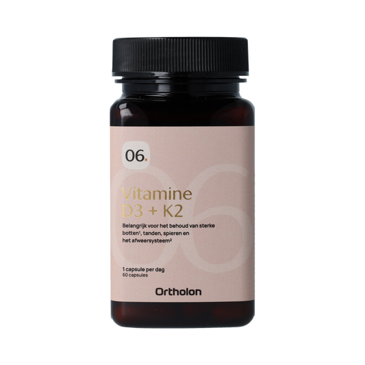 Ortholon Vitamin D3 + K2 capsules in a bottle, dietary supplement for bone health and immune support.