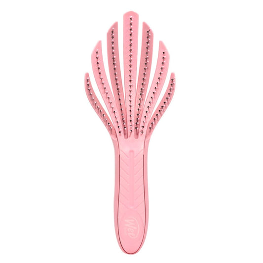 Wet Brush Go Green curl detangler sponge and brush set in pink, designed for easy detangling of curly hair.